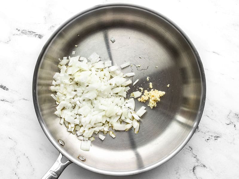 Diced onion and minced garlic in a skillet