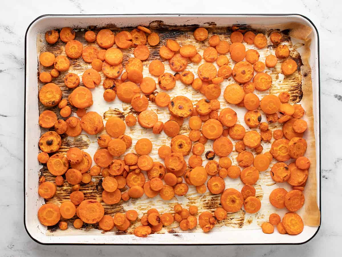 Overhead shot of sheet pan with roasted carrots.