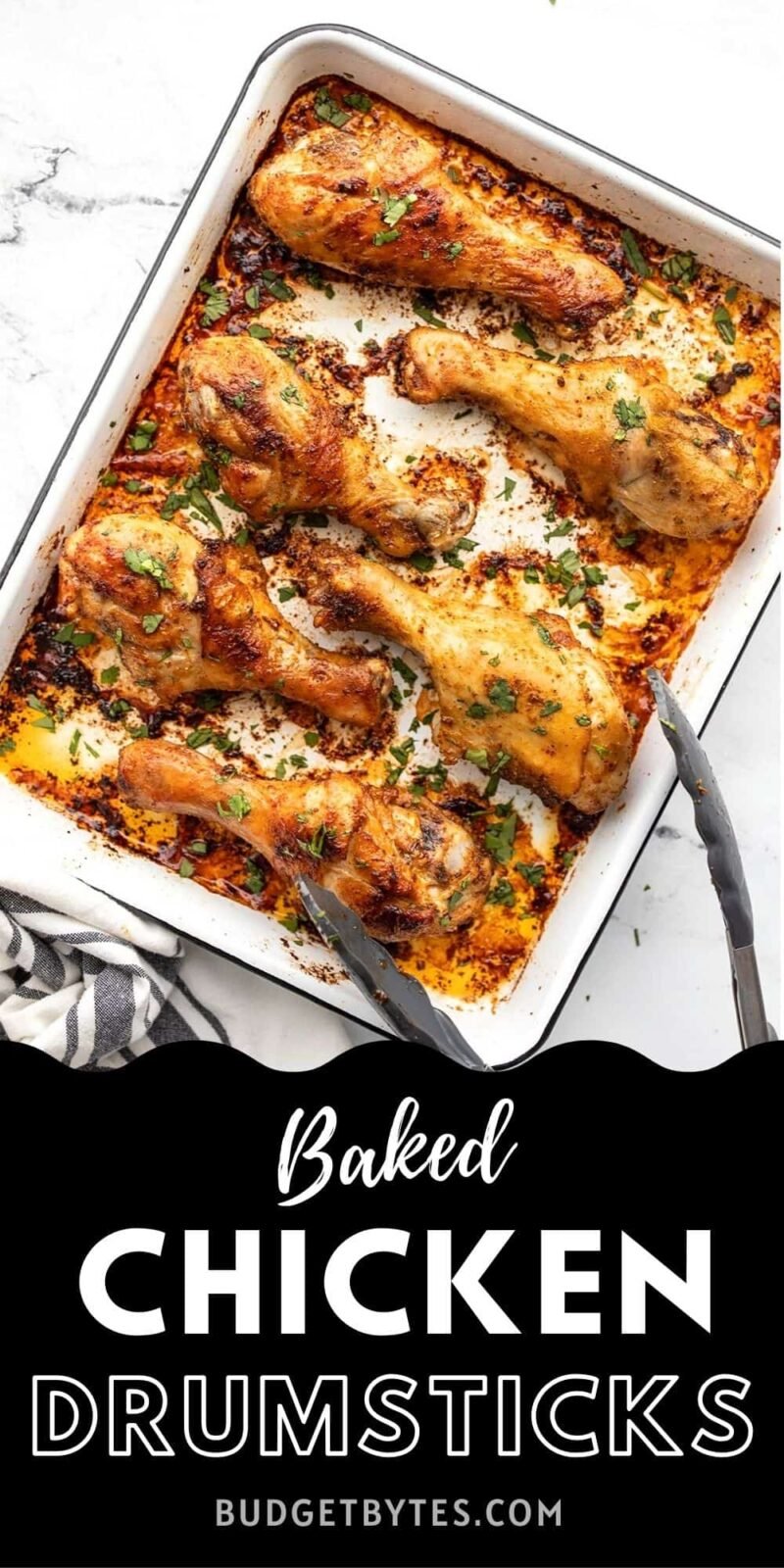 Baked chicken drumsticks on a baking sheet with tongs, title text at the bottom