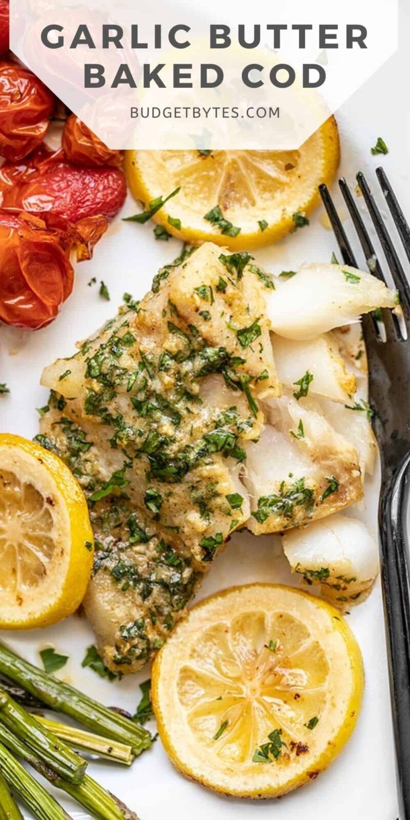 Close up of garlic butter baked cod on a plate, title text at the top