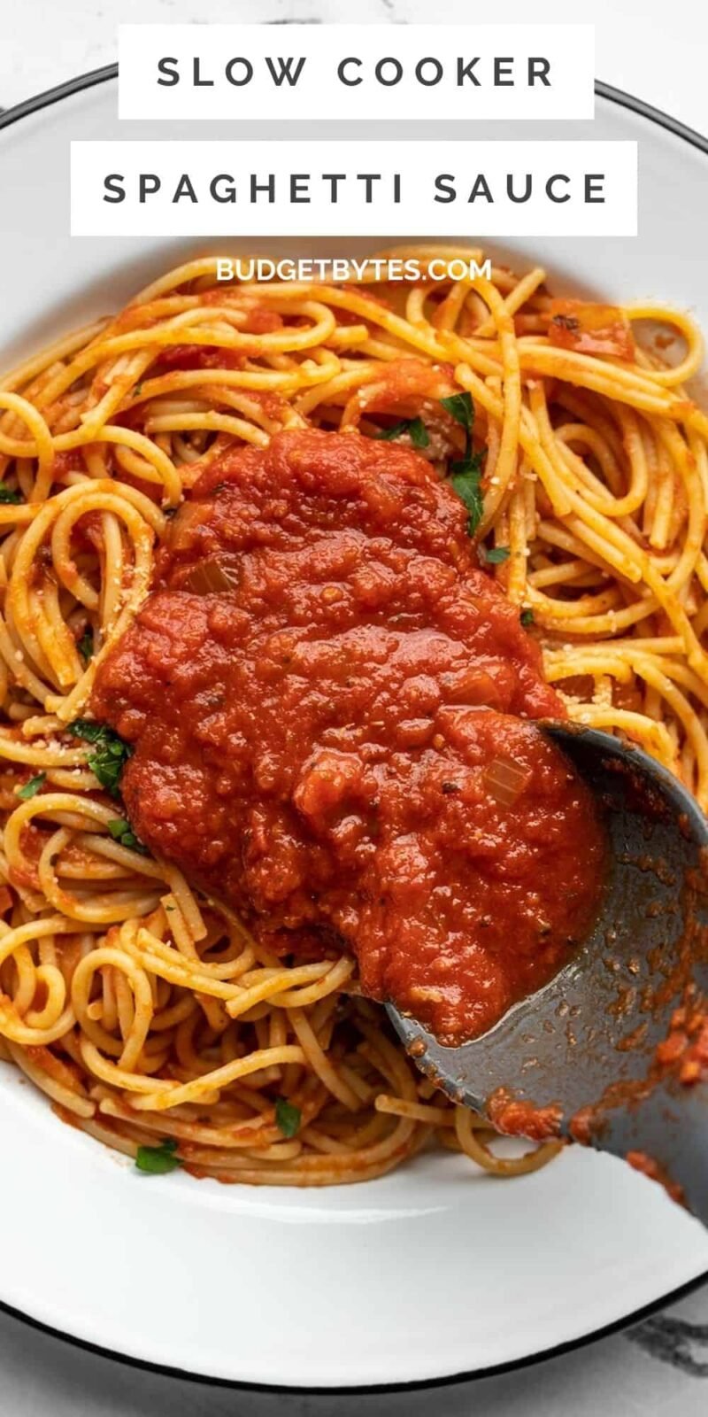 Spaghetti sauce being spooned over a plate of spaghetti, title text at the top