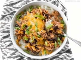 Slow Cooker Taco Chicken Bowls are the ultimate "set it and forget it" easy weeknight meal that the whole family will love. BudgetBytes.com